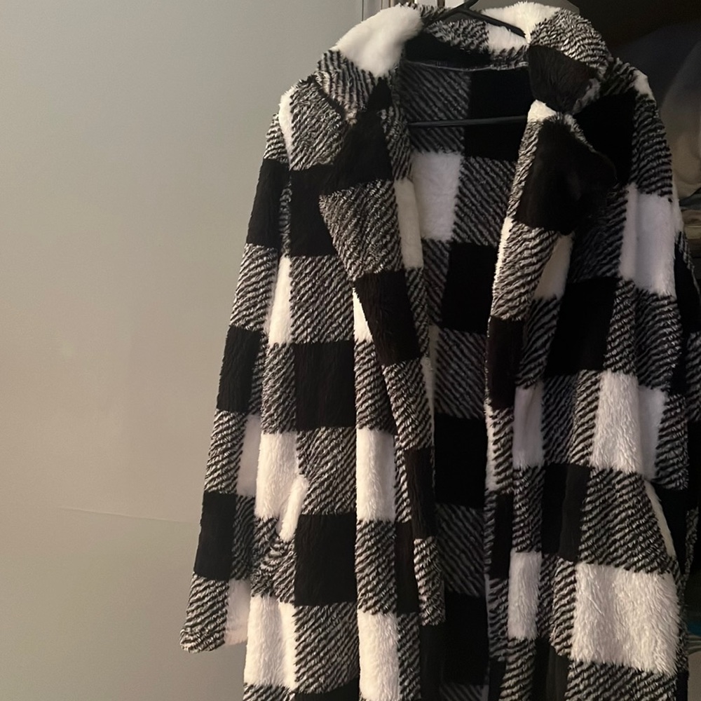 Black and white plaid flannel coat.